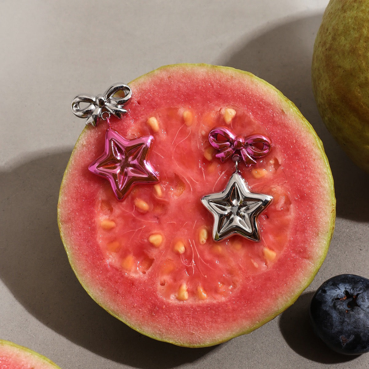 M2M pink star earrings