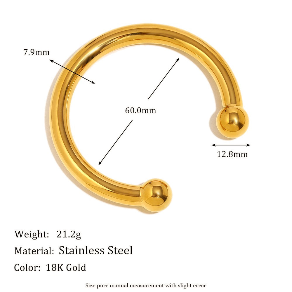 Gold beady statement bangle