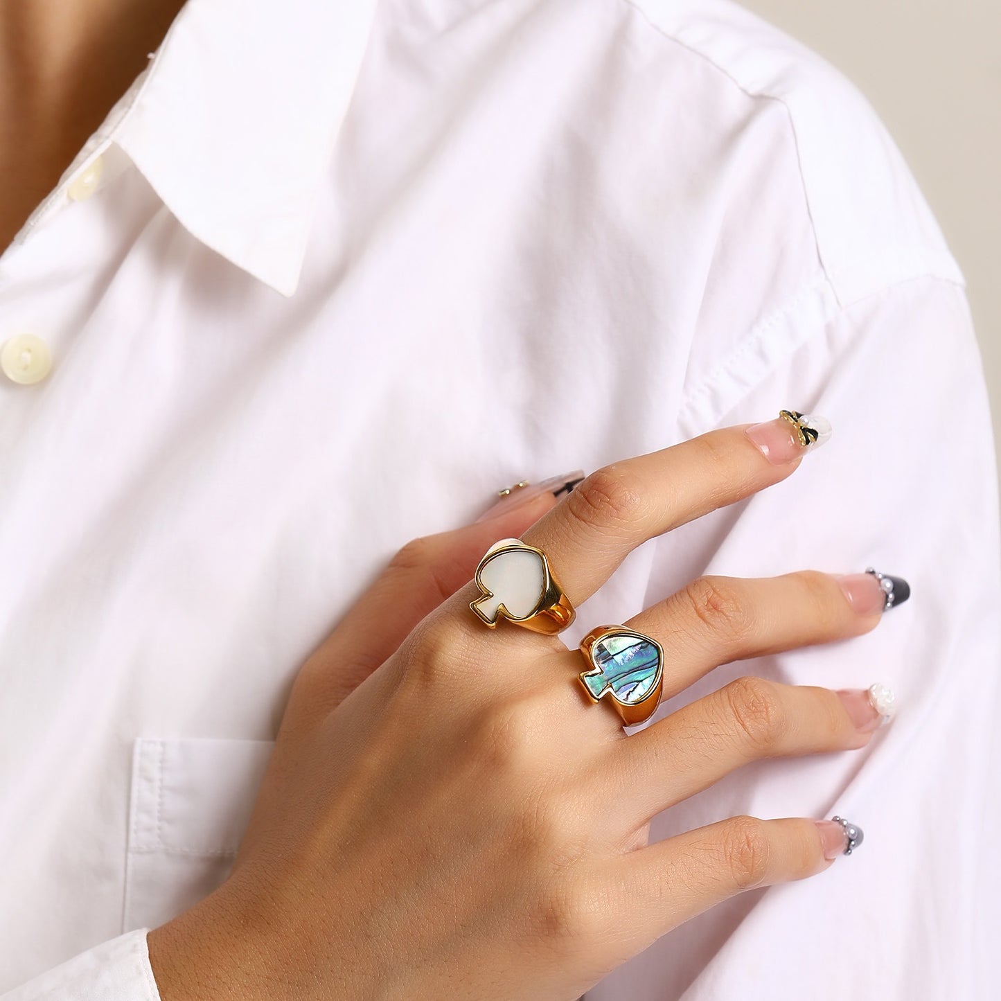 Poker face heart ring