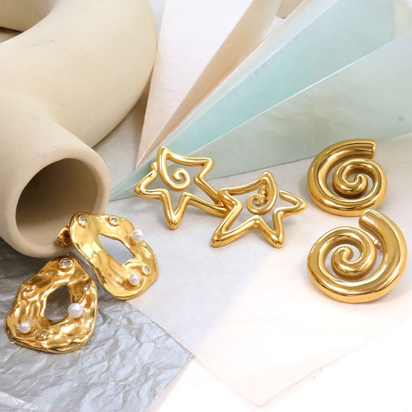 Swirl star earrings