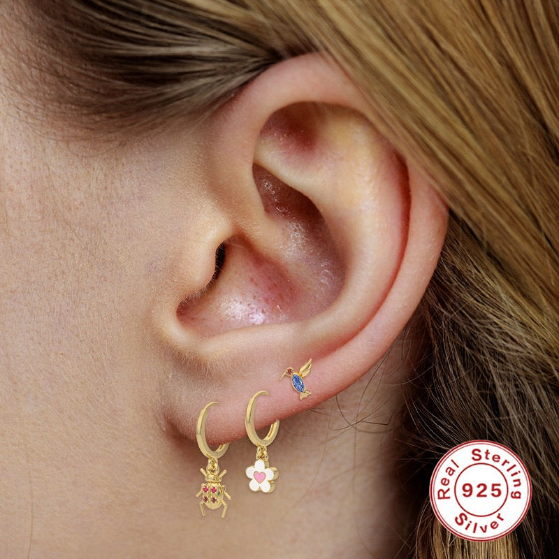 Dainty sterling silver flower hoops