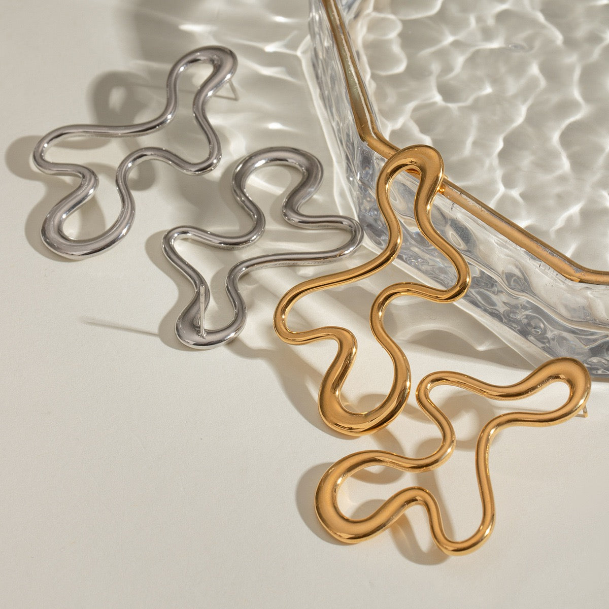 Melting lines earrings