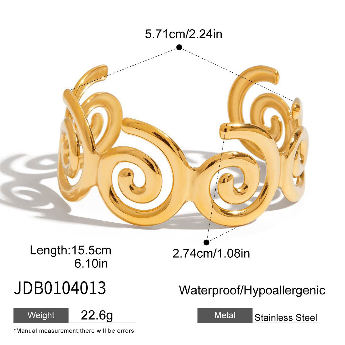 Swirl gold bangle
