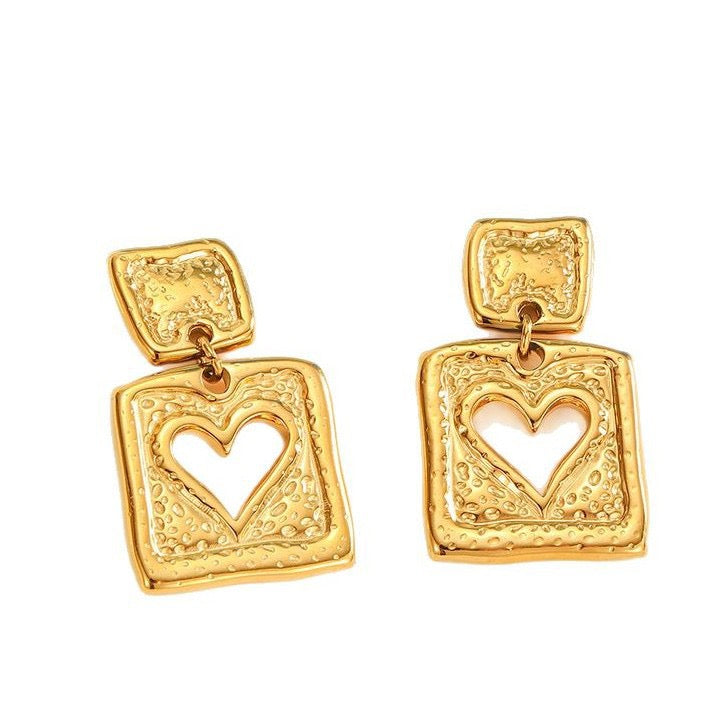 Heart charm earrings