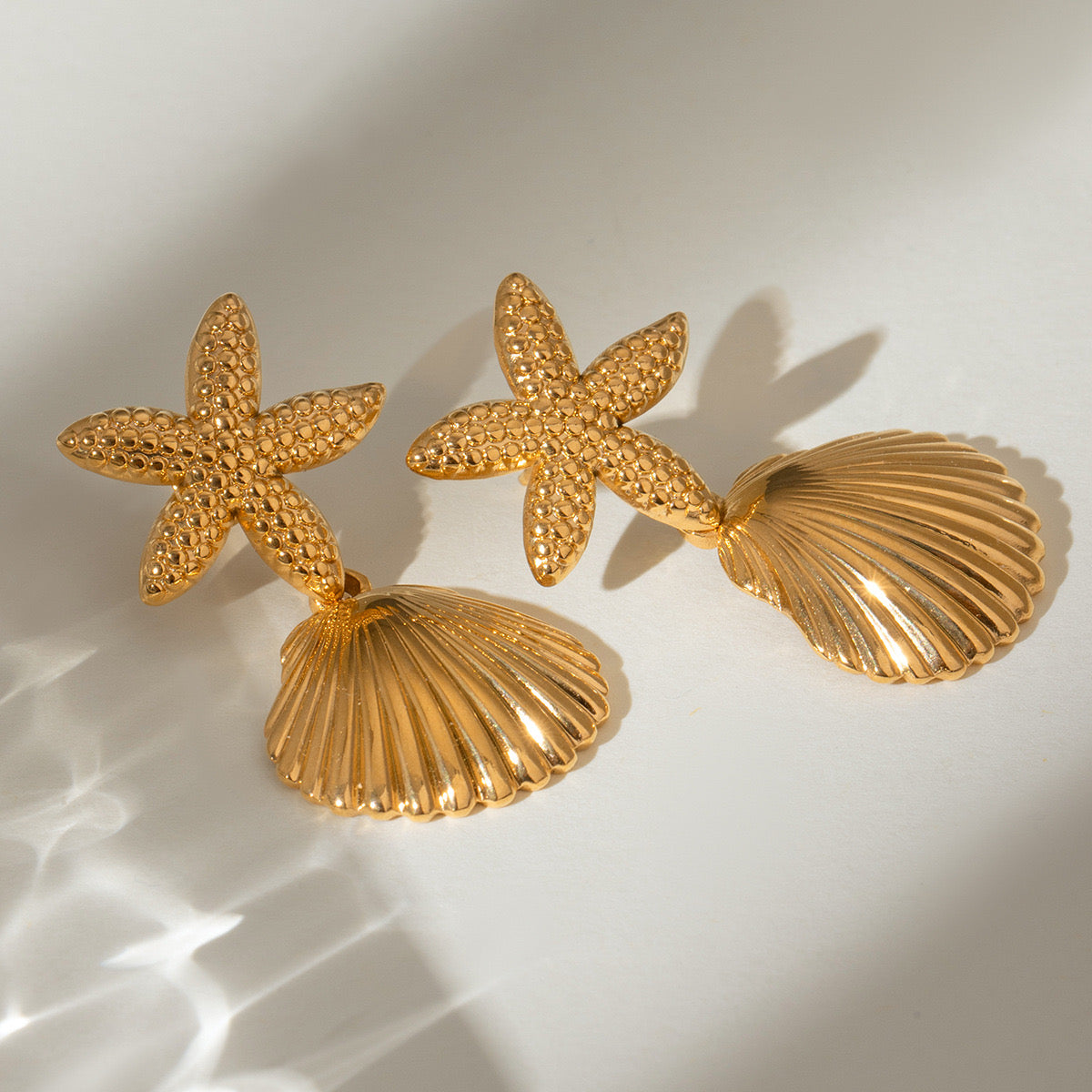 Cylina Bondi star shell earrings