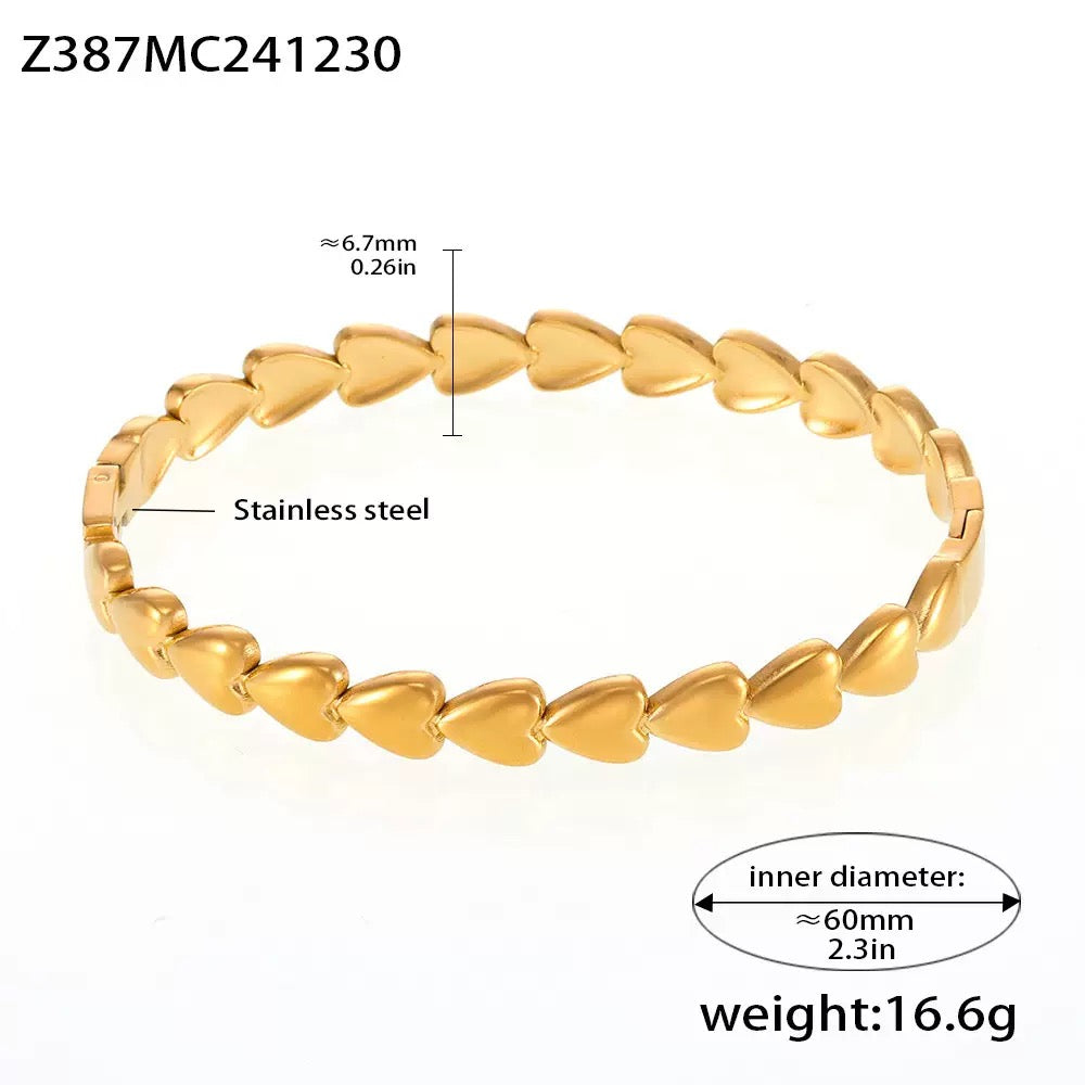 Gold heart bangle