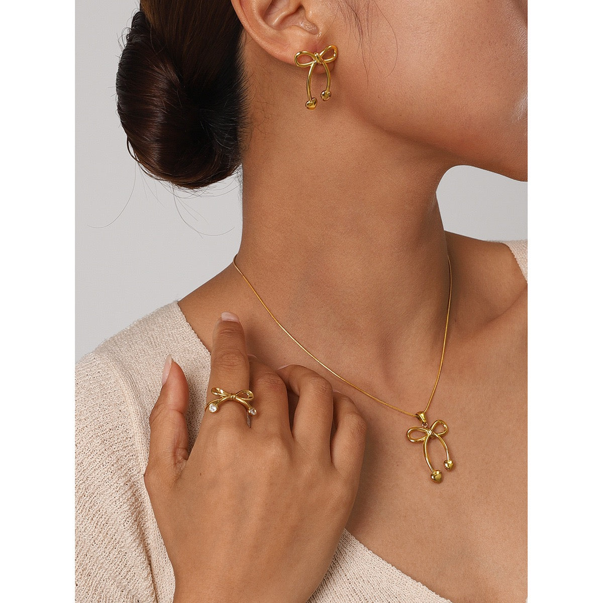 Bravery Bow heart earrings