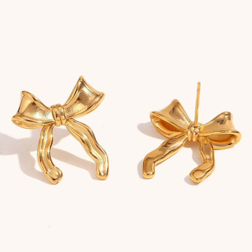 Pearly bows and butterfly earrings