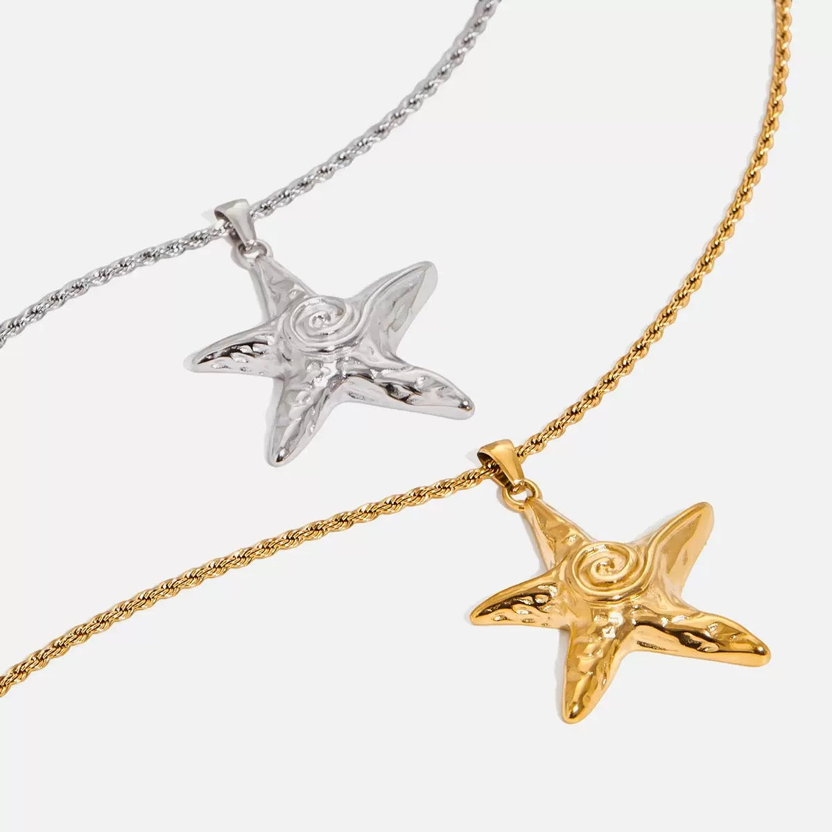 Swirl star necklace