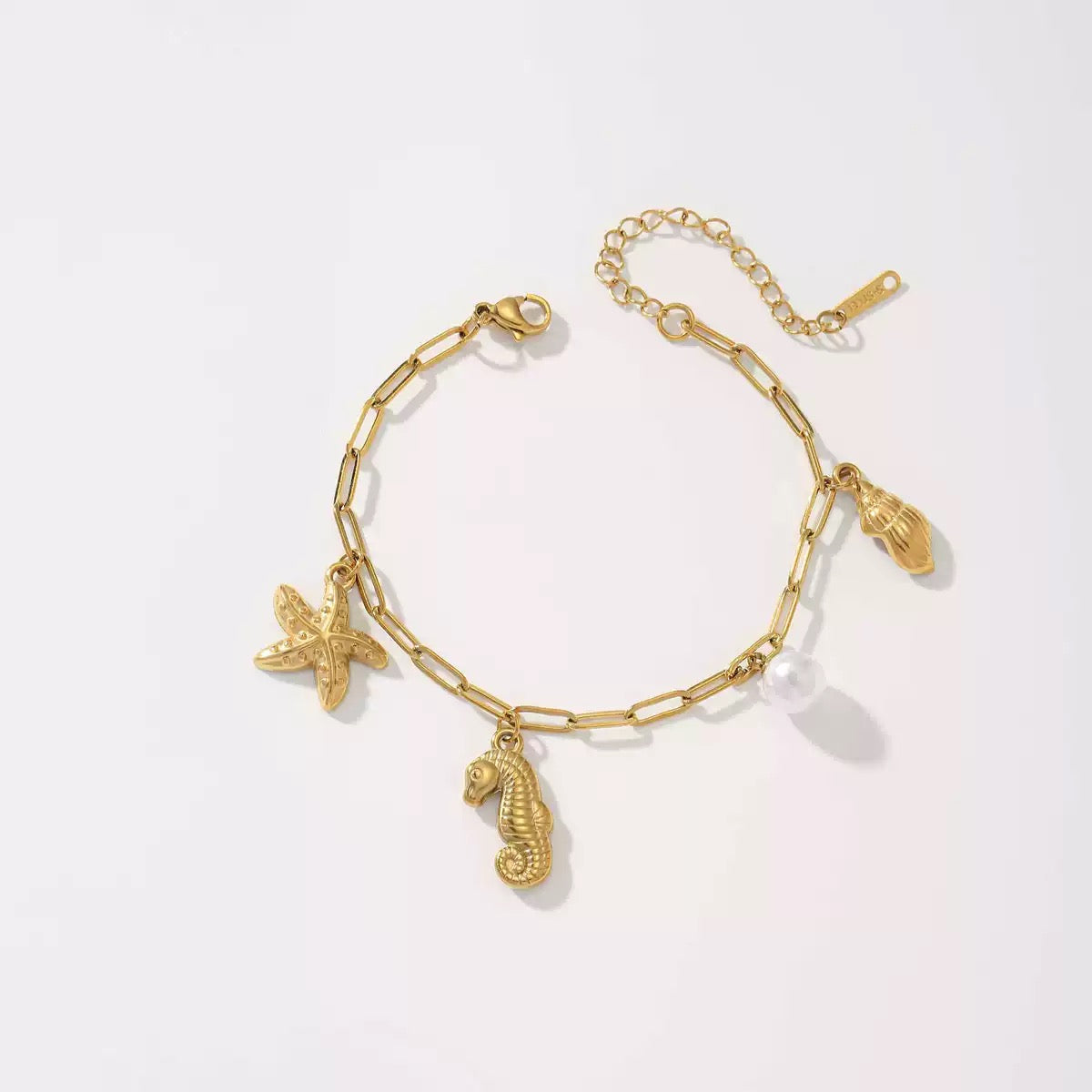 Seahorse and turtle charm shell bracelet