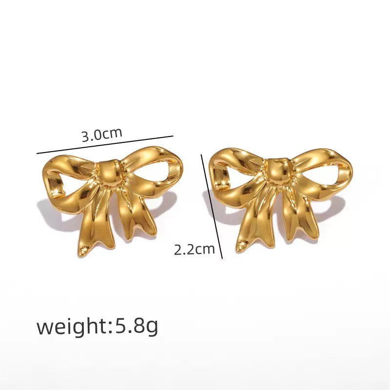 Pearly bows and butterfly earrings