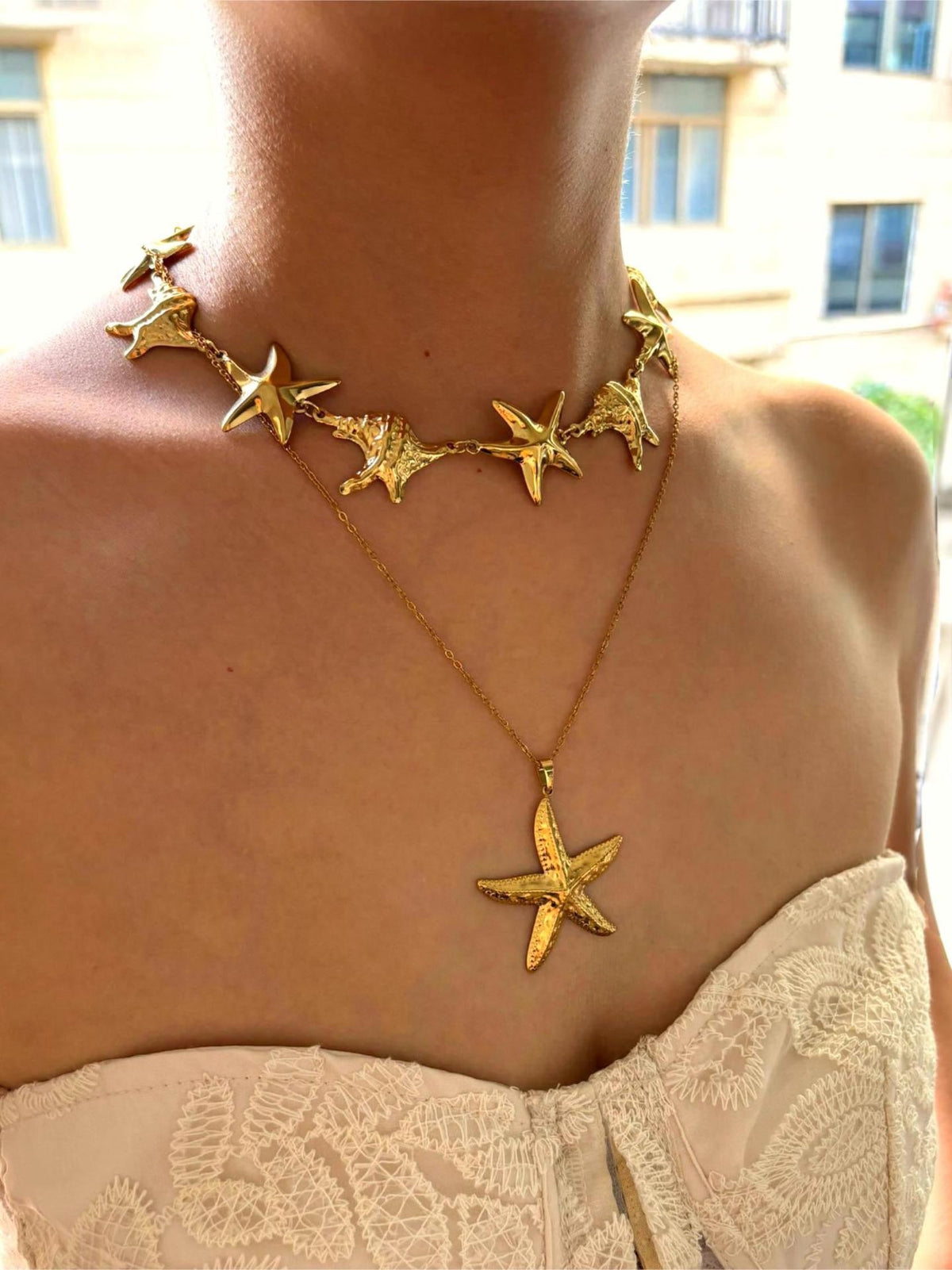Pink starfish charm necklace