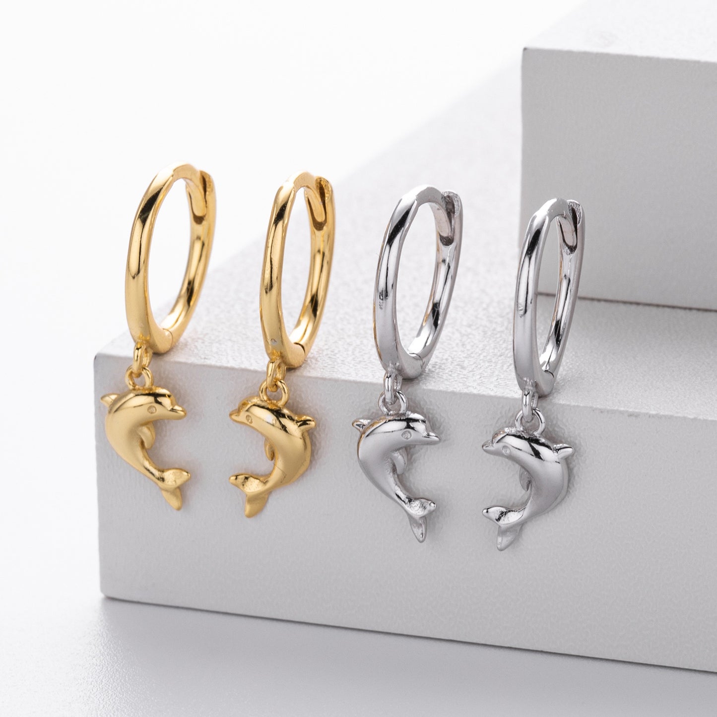 Sterling silver dolphin hoops