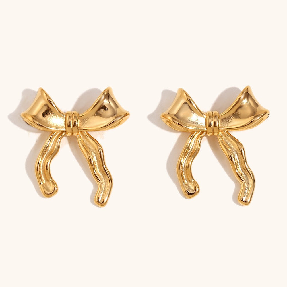 Pearly bows and butterfly earrings