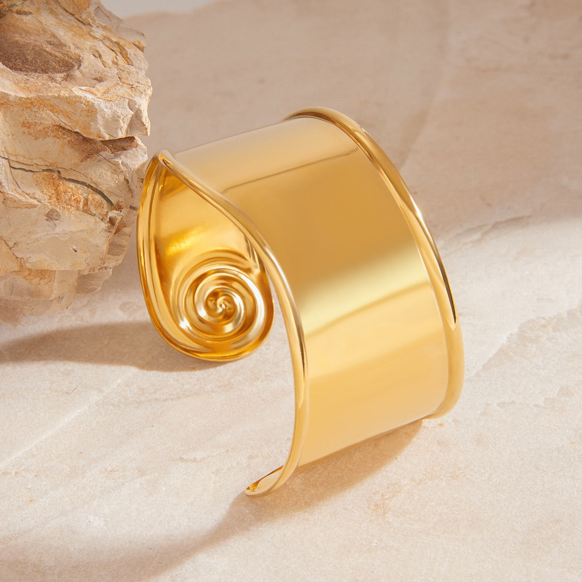 Swirl statement bangle