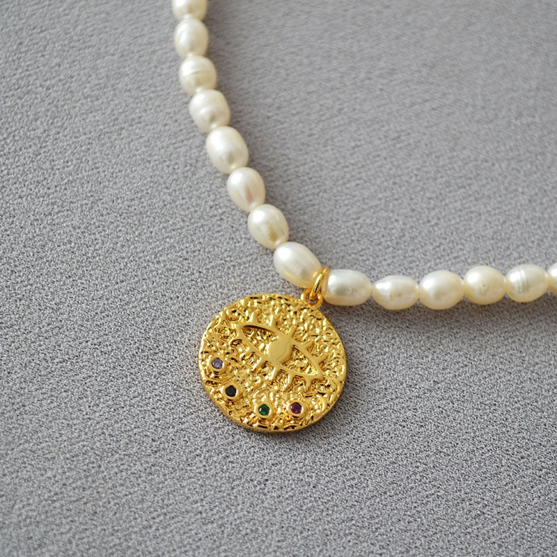 Nina Evil eye pearl necklace