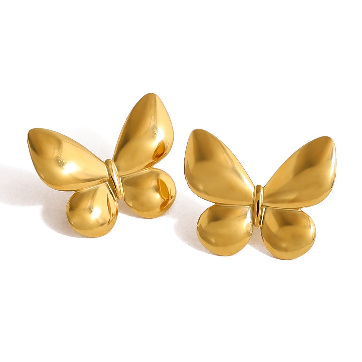Pearly bows and butterfly earrings