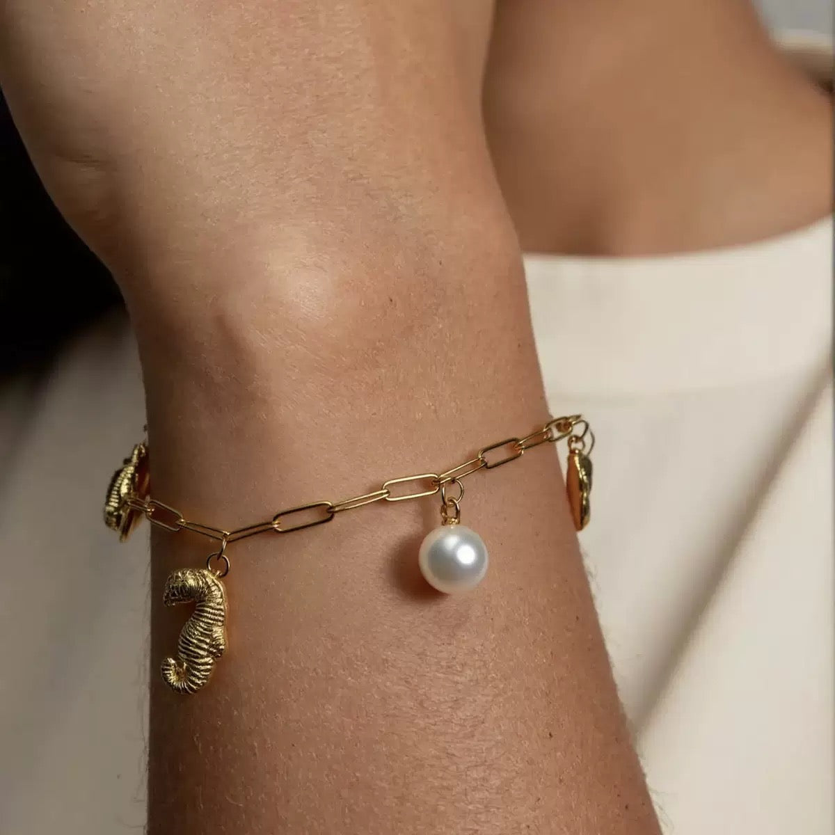 Seahorse and turtle charm shell bracelet