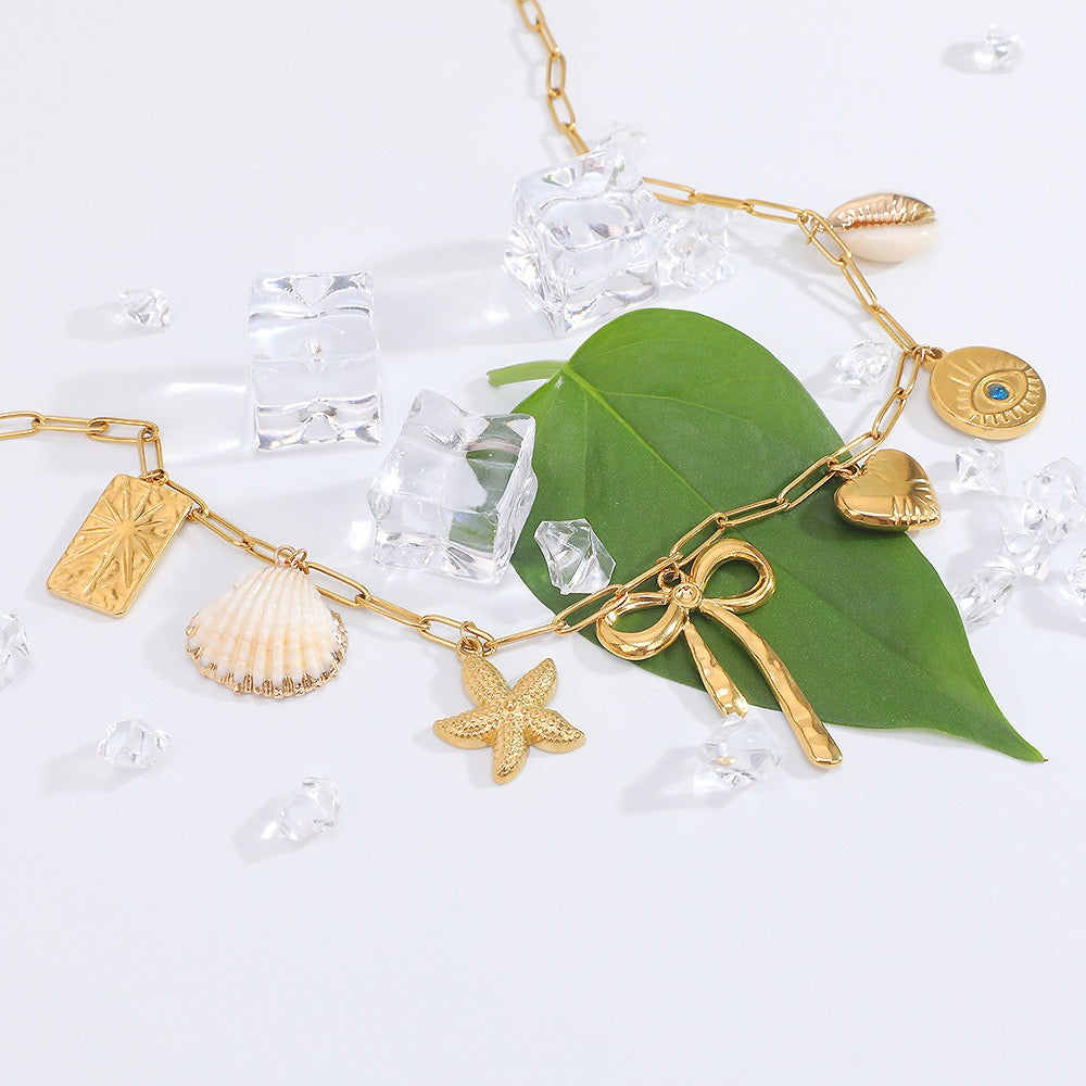 Bow shell starfish charm necklace