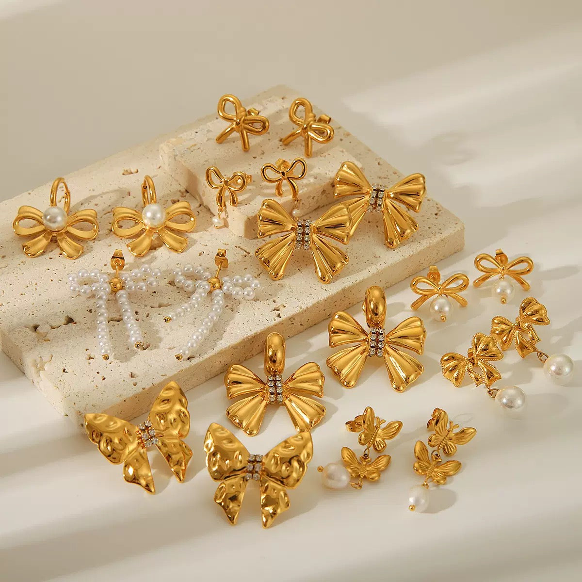 Pearly bows and butterfly earrings
