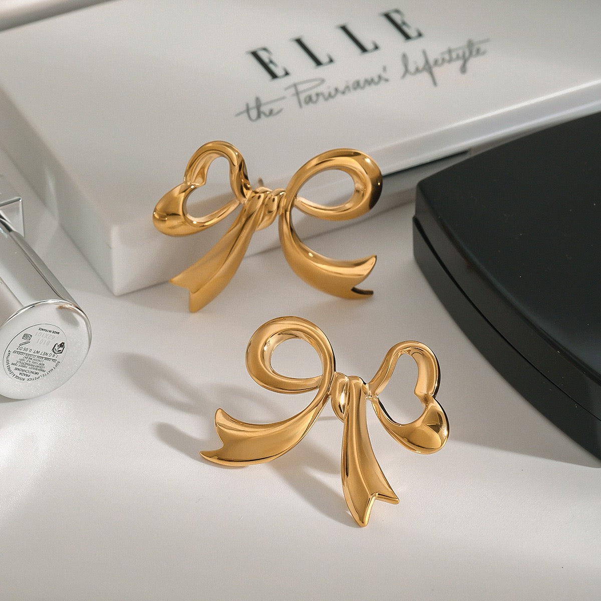 Pearly bows and butterfly earrings