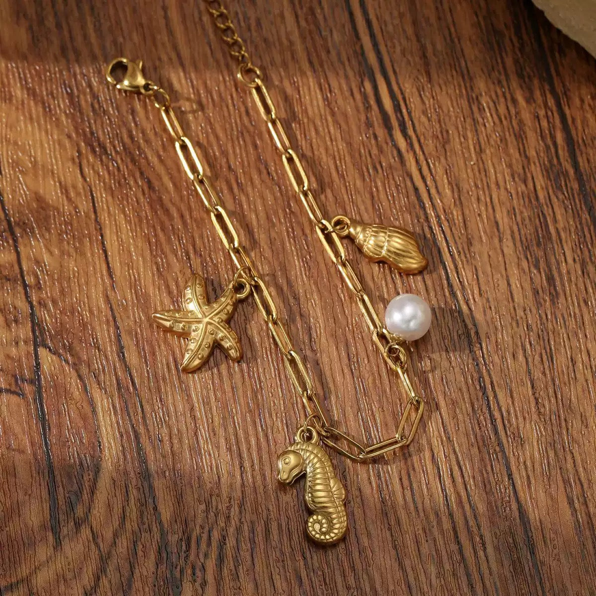 Seahorse and turtle charm shell bracelet