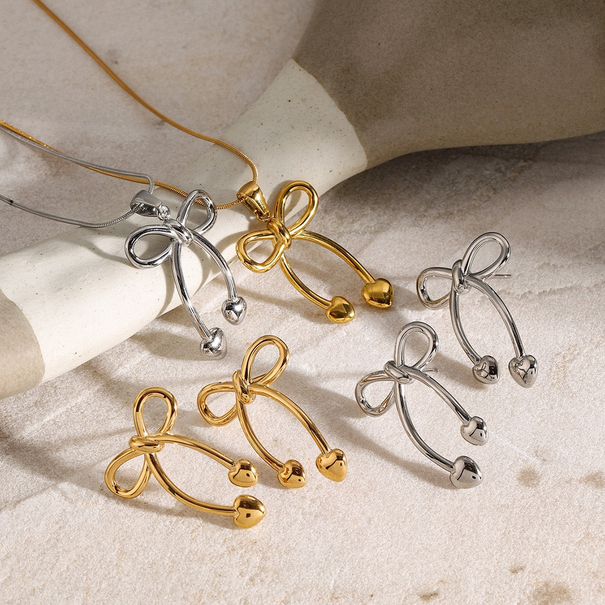 Pearly bows and butterfly earrings