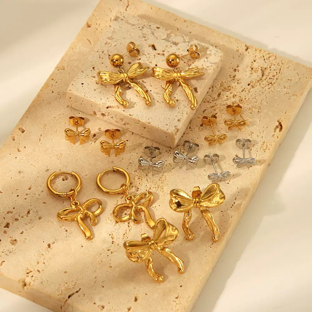 Pearly bows and butterfly earrings