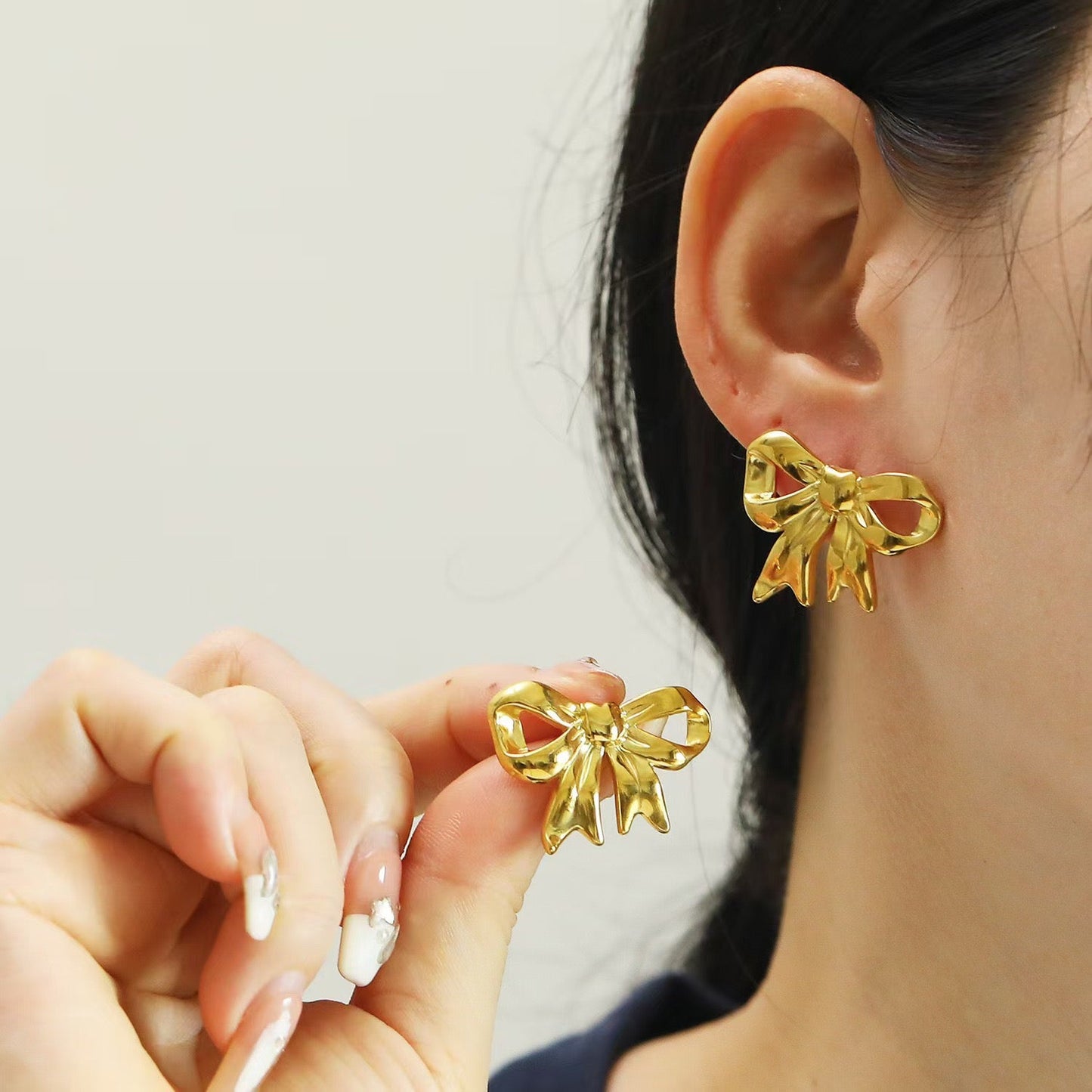 Pearly bows and butterfly earrings