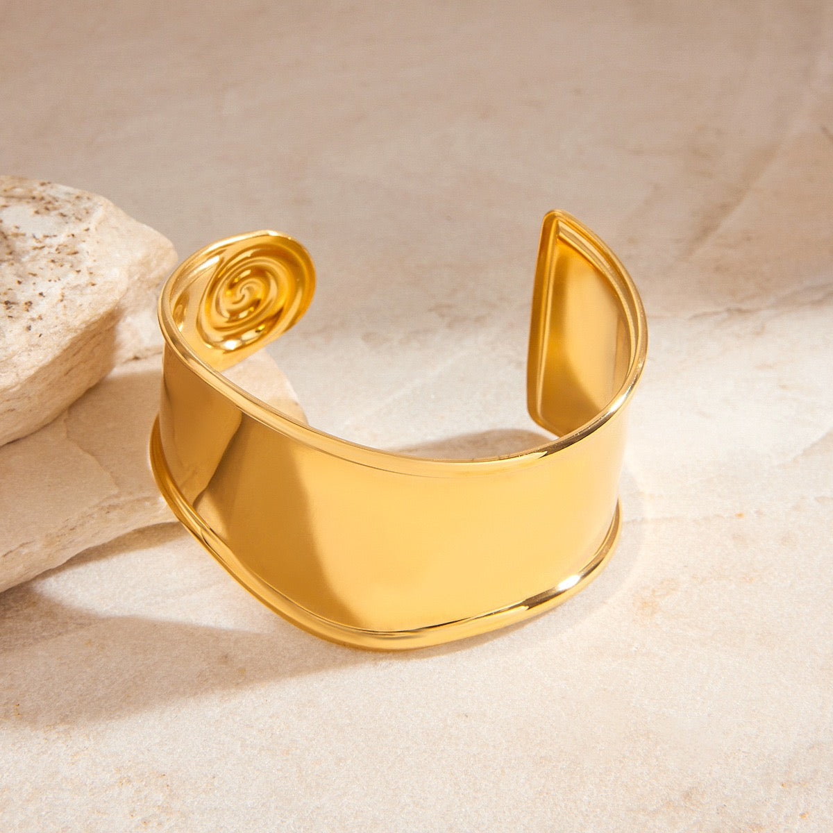 Swirl statement bangle
