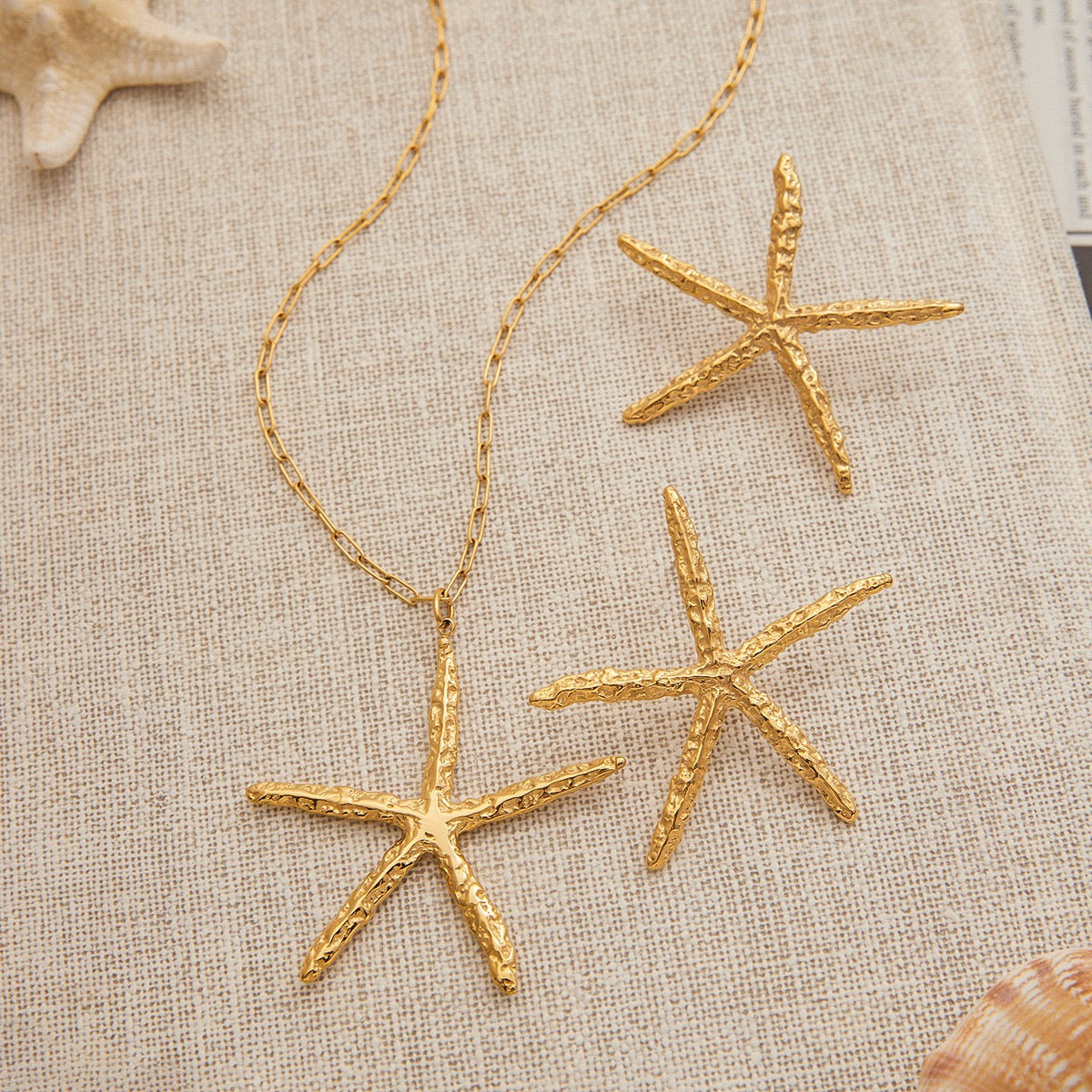 Pink starfish charm necklace