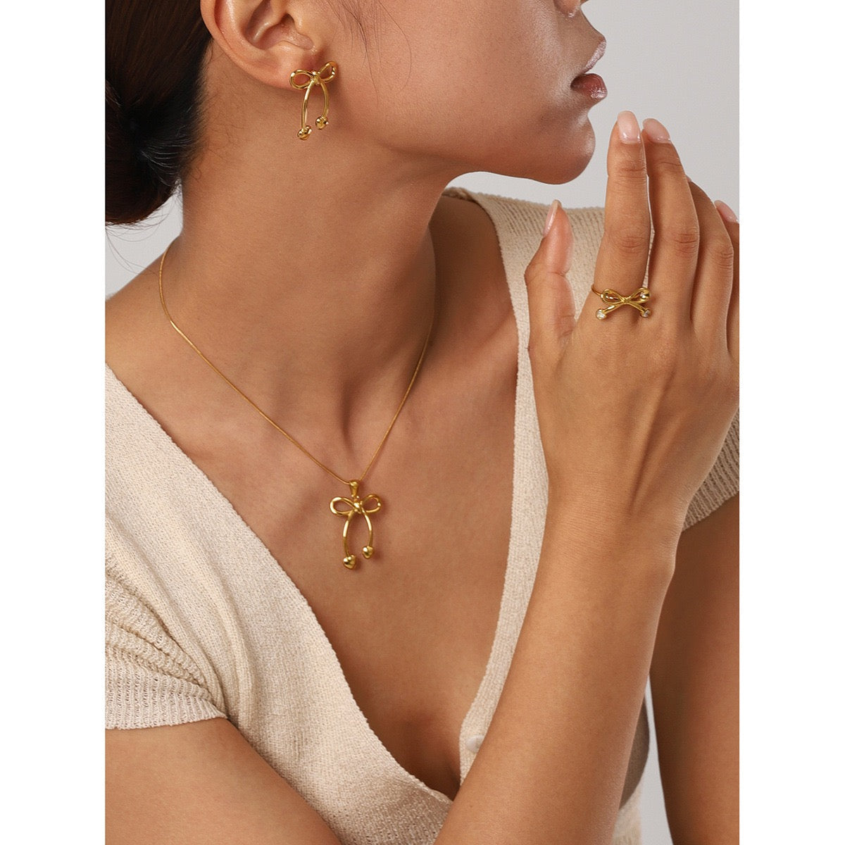 Pearly bows and butterfly earrings