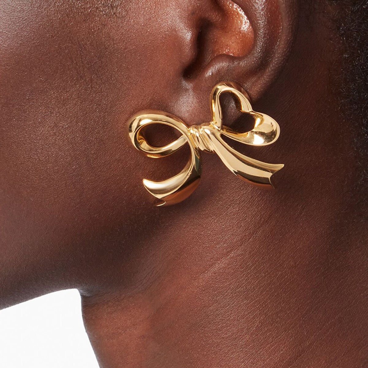 Pearly bows and butterfly earrings