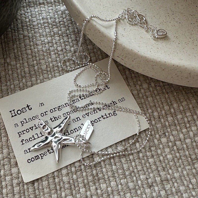 Pink starfish charm necklace