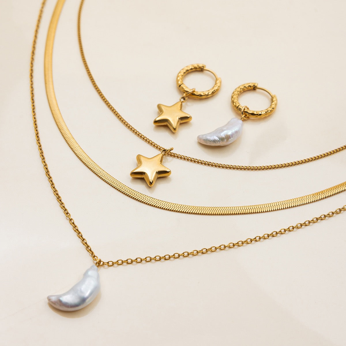 Pearly star and moon set