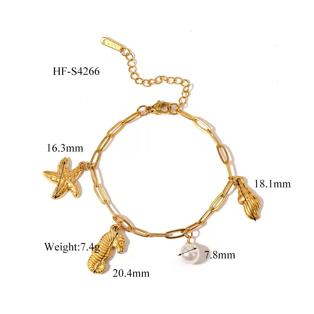 Seahorse and turtle charm shell bracelet