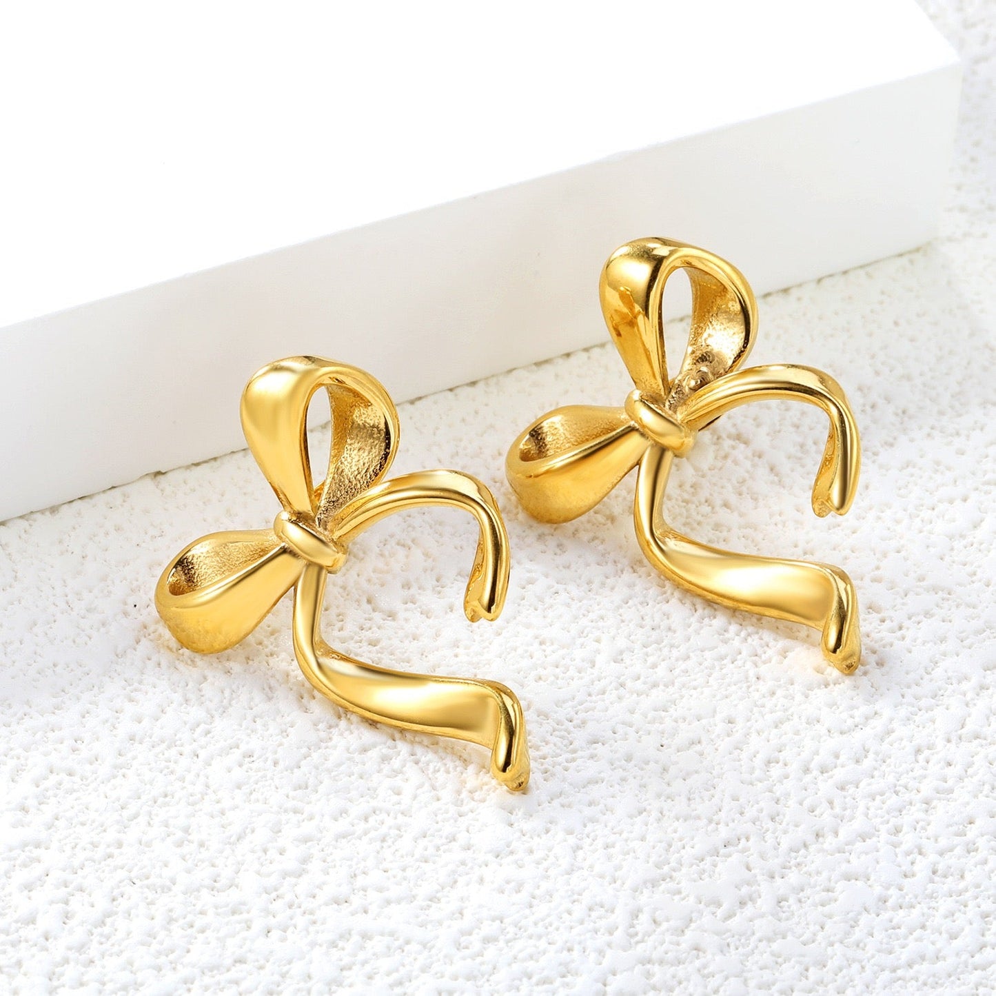 Pearly bows and butterfly earrings