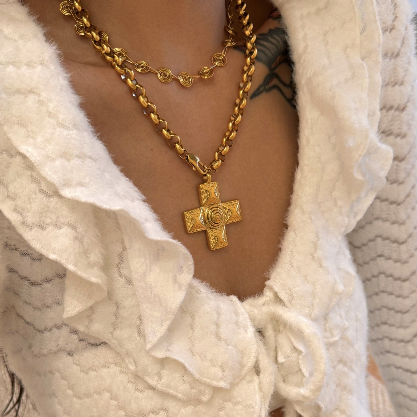 Swirl cross necklace