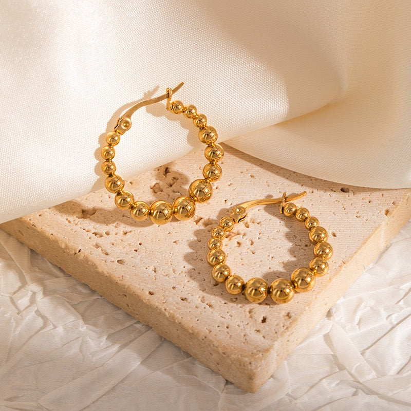 Reminiscence hoops earrings