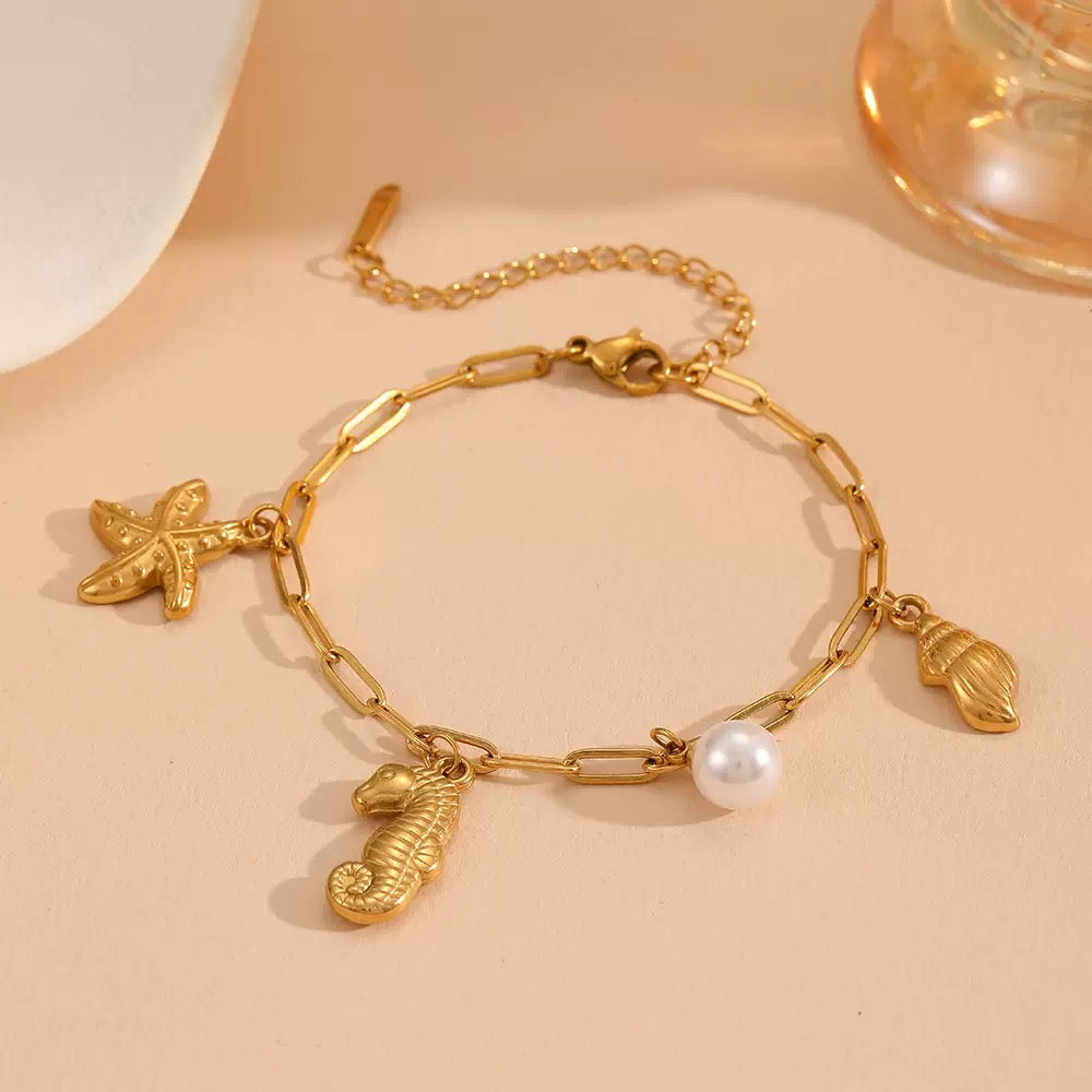 Seahorse and turtle charm shell bracelet