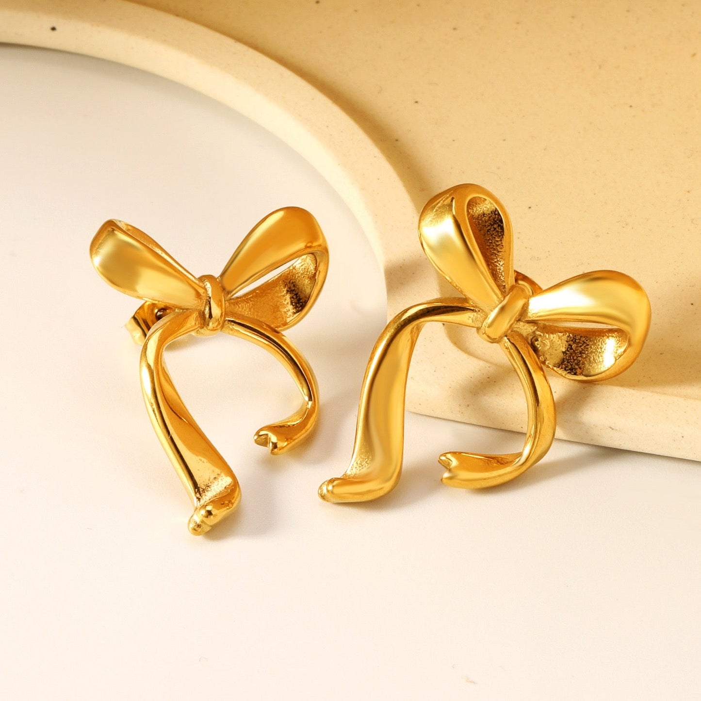 Pearly bows and butterfly earrings