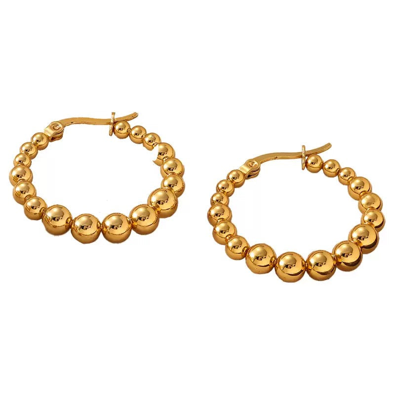 Reminiscence hoops earrings