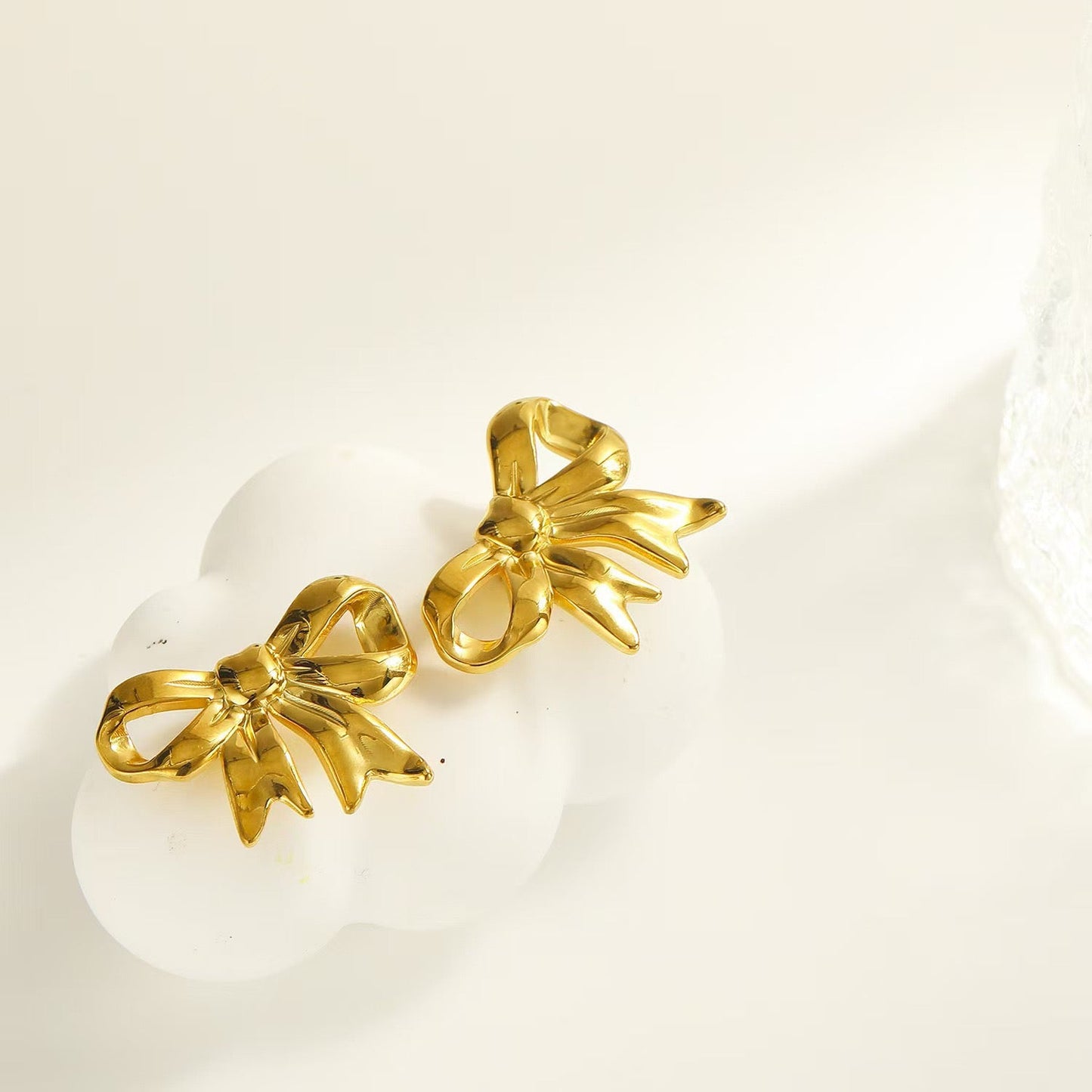 Pearly bows and butterfly earrings