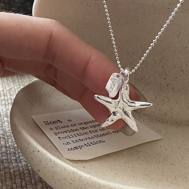 Pink starfish charm necklace
