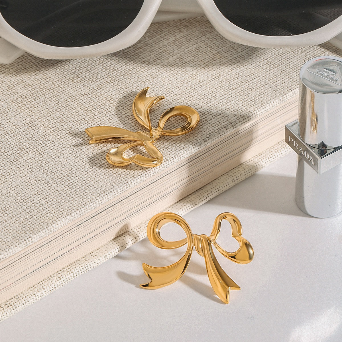 Pearly bows and butterfly earrings