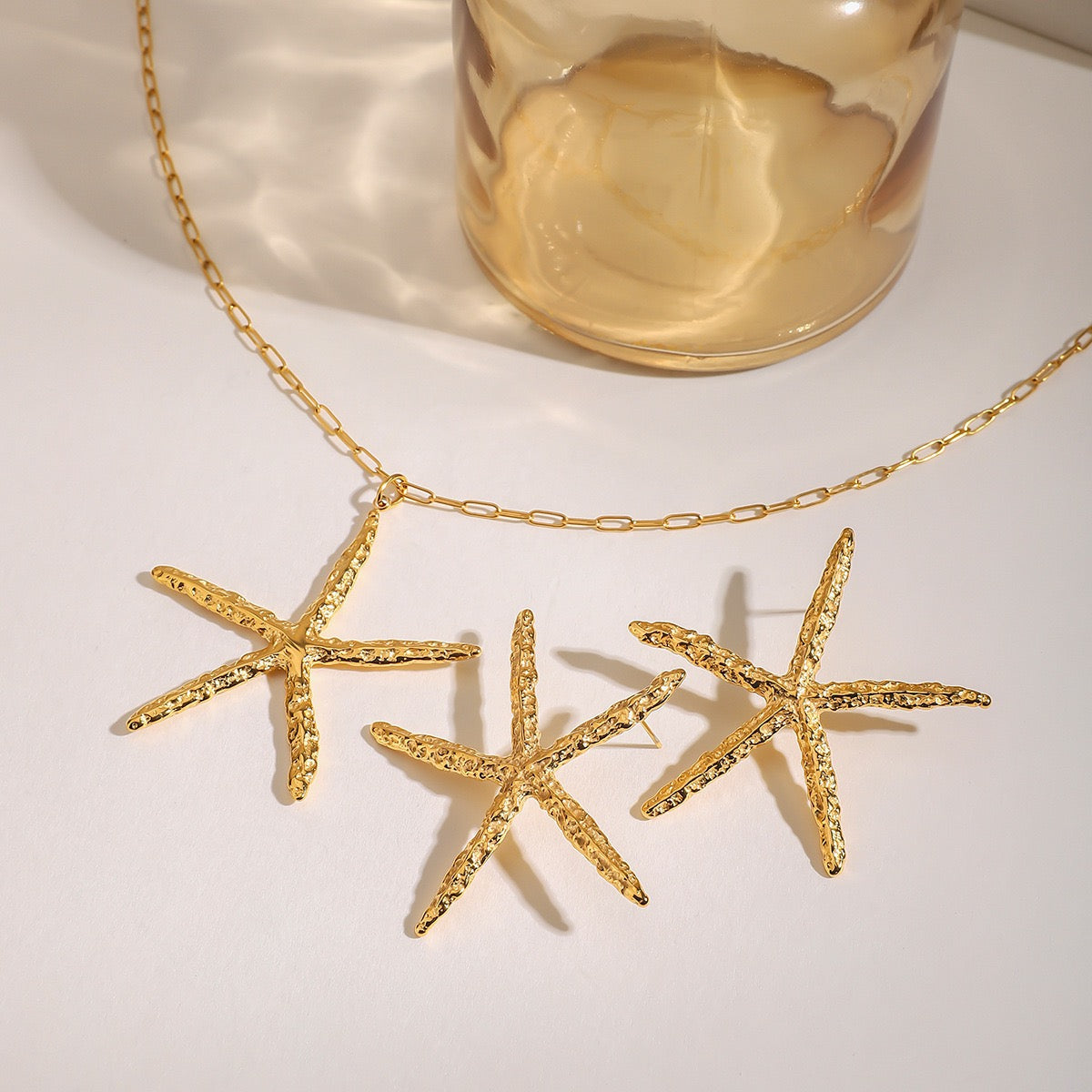 Pink starfish charm necklace