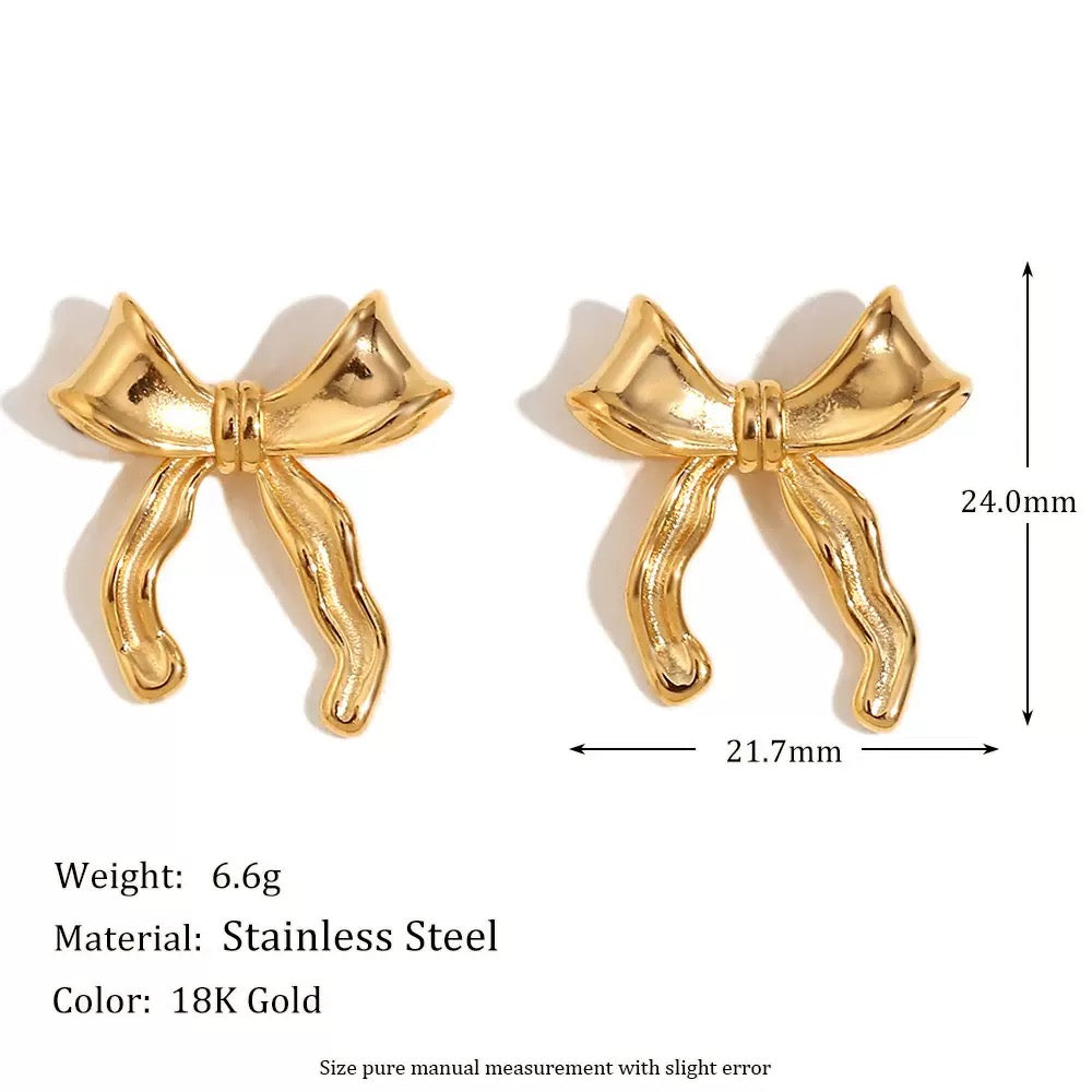 Pearly bows and butterfly earrings