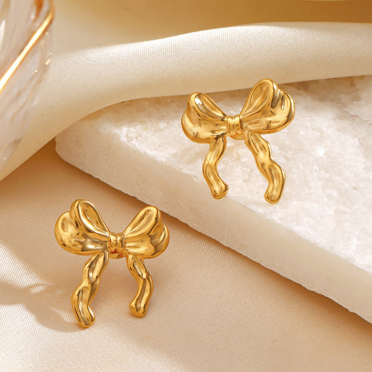 Pearly bows and butterfly earrings