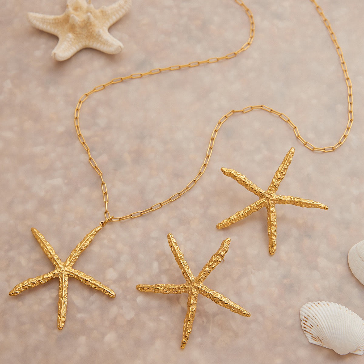 Pink starfish charm necklace