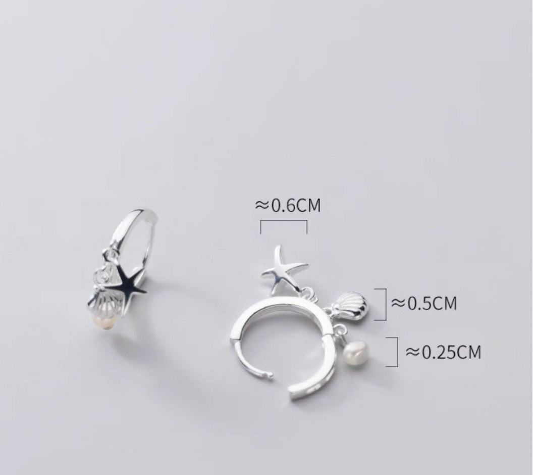 Dainty sterling silver starfish hoops
